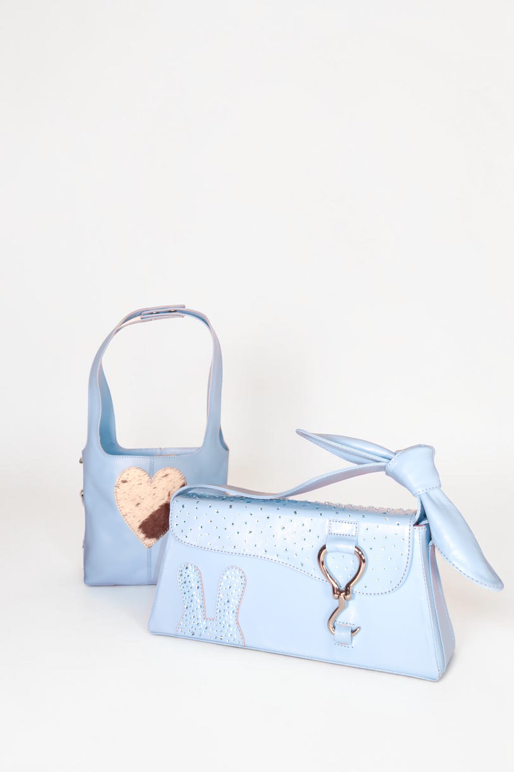 Design Girls World Mommy & Me blue leather handbag set with crystal bunny details and a heart accent.